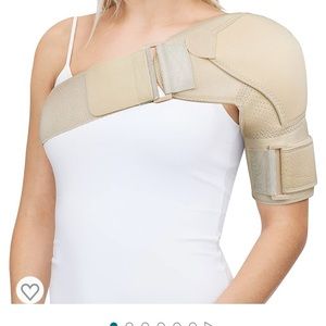 Woman’s right shoulder brace with cold pack pocket